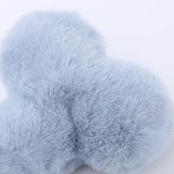Hueso de peluche chirriante para perros 