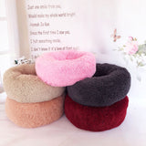 Round plush pet nest bed.