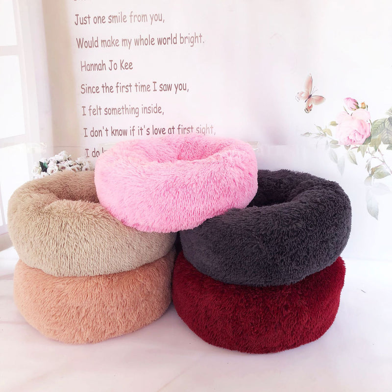 Round plush pet nest bed.